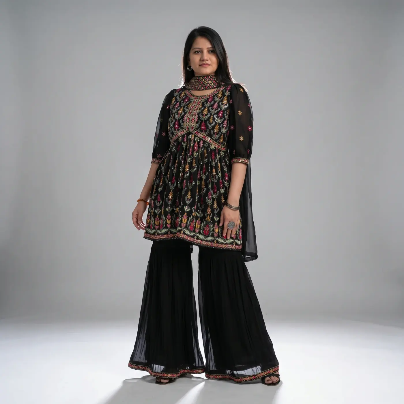 Fashion lifestyle image: black georgette sharara studio